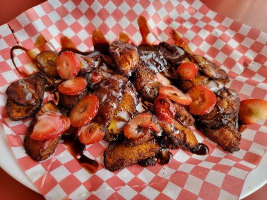 Platanos fritos with strawberries and chocolate sauce