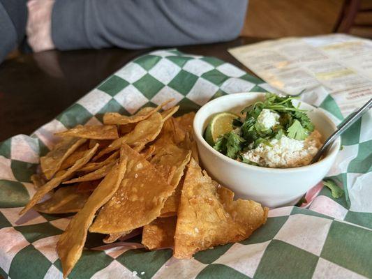Creamy poblano & elote dip with tortilla chips