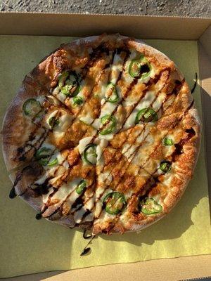 White sauce with jalapeño and roasted garlic drizzled with balsamic