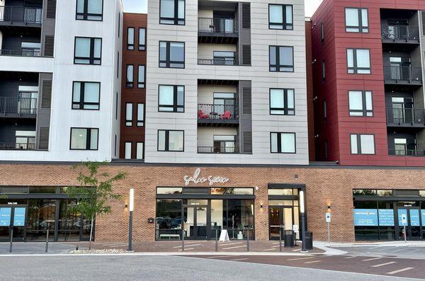 Outside / Exterior shopfront of salon - in the Midtown Row Center - near Monticello & Richmond Rd - below Current Midtown Apts