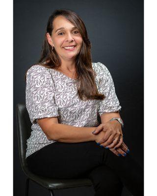 Genie Watson - Marzucco Real Estate