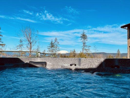 A clear beautiful day in the hot tub with a Mt Saint Helens view.