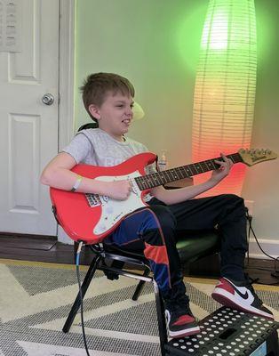 Bob jamming to some AC DC