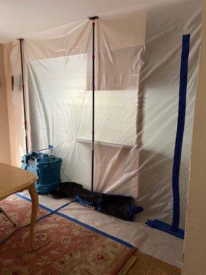 Containment with negative pressure to prevent cross contamination