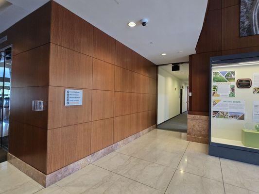 Turn right: Hallway leading to the "Alex Ross: Heroes & Villains" exhibition at the new space