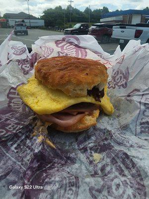Monster biscuit with ham sausage bacon egg and cheese