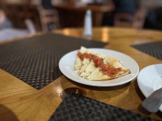 A gift from the chef: pita with some kind of marinara sauce.