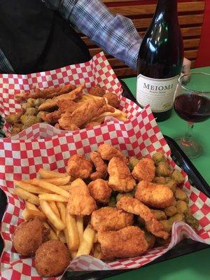 Fried halibut chunks and fried catfish both with fried okra and french fries. Holy moly it is good!
