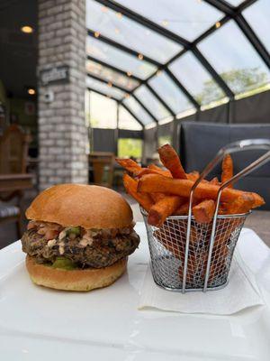 Cali Burger;
House-made black bean burger, queso, avocado, pico de gallo, and chipotle ranch on a brioche bun.