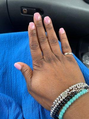 Beautiful pink overlay over natural nails. The lady did a great job at nail booth #2