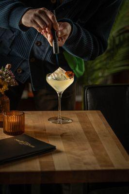 The White Lotus: Jasmine tea-infused Lime Rock Gin, Lychee, Peach, Honey, Milk-washed, Chili Mezcalin, Orange blossom water  Rely on Rach