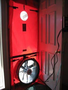 We use a blower door to test the house