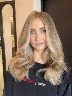 Face framing with highlights.