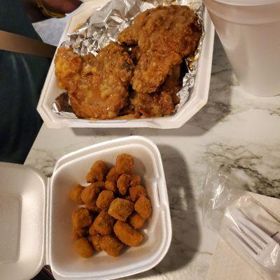 Smothered pork chops and fried okra.