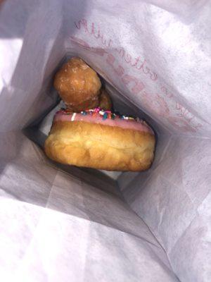 Pink sprinkle donut with extra two donut holes :)