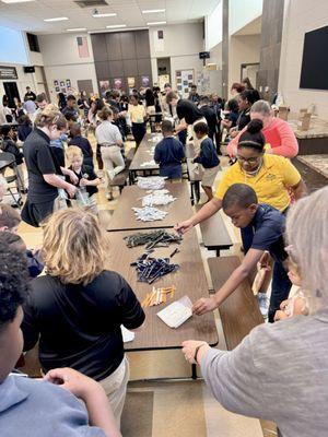 Students assembled over 150 hygiene kits to help flood victims.