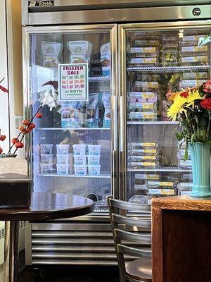 Country loafs, ice cream, biscuit rolls, danish assortment, scones, muffins, cinnamon rolls, rolls and donuts.