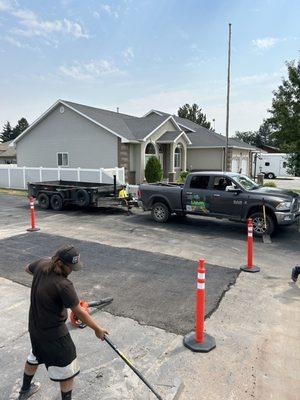 Here we are cleaning up the area after laying the patch down.