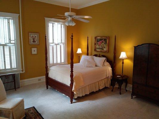 Room 2 offers a romantic queen size spindle bed in a historic setting.