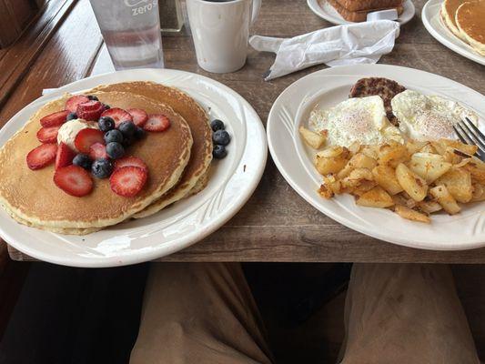 Short stack with berries and egg breakfast