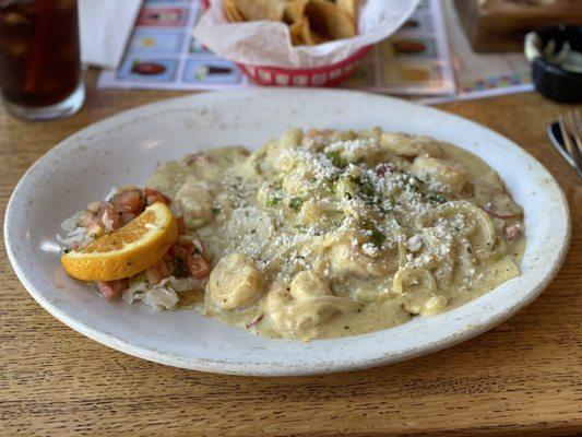 Creamy Garlic Shrimp - cooked in a creamy garlic sauce with onions and bell peppers over rice