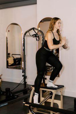 Standing on the split pedal exo chair