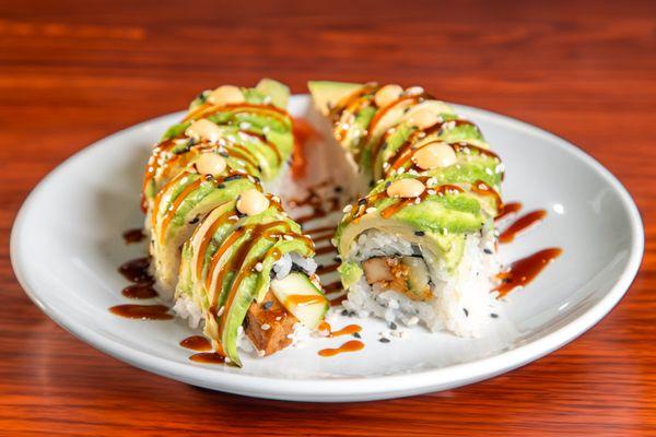 WC Roll ( sweet potato, cucumber and tofu topped with layers of avocado, soy glaze and vegan spicy mayo)