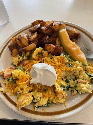 Smoked salmon scramble with well-done home fries