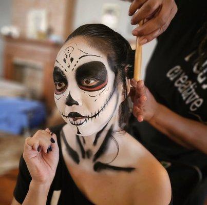 Hair and face paint by the NOLA Creative Team