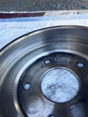 Picture of a drum from brake pads and brand new drums from Miles Auto Parts