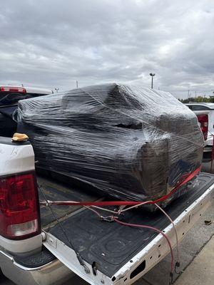 Couch wrapped up and protected