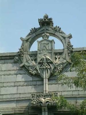 At the top of the building