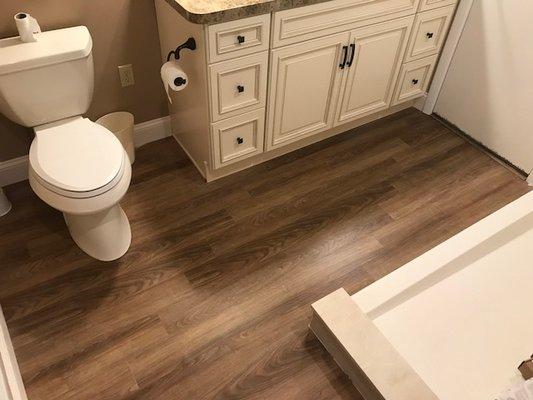 With water resistant technology Coretec Vynl Plank flooring is a great alternative to tile is the bathroom.