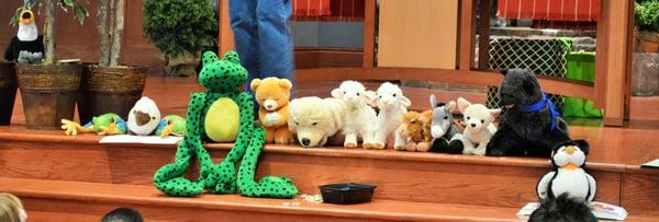 Friendly friends accompany the kids to Chapel Time.