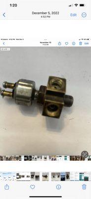Proportioning valve with brake stop light switch attached