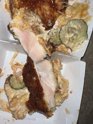 Raw chicken from sams The Original Sam's Crispy Chicken Sandwich