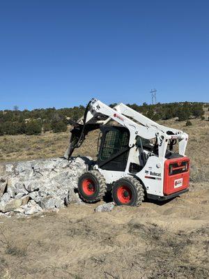 Removing Concrete with Jack Hammer.