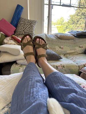 Birkenstocks with a narrow ankle strap. The Arizonas push into my ankle but these are comfy.