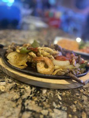 Shrimp, Chicken, and Steak Fajitas