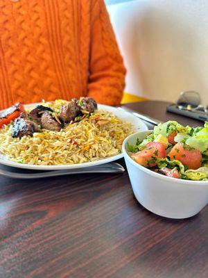 BEEF KABOB- In- house minced beef skewered and grilled to perfection, served with seasoned rice and salad.
