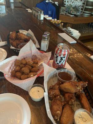 Wings... naked...well done and spicy cheese curds... fergettaboutit.