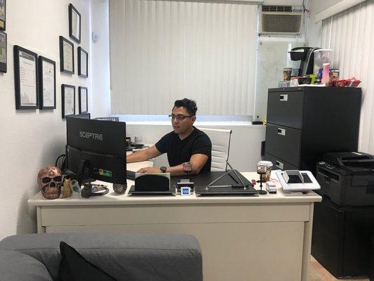 Javier working his magic for my affordable insurance!