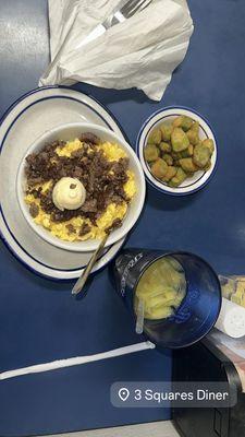 Grits bowl with cheesy eggs and sausage Fried Okra Orange Juice