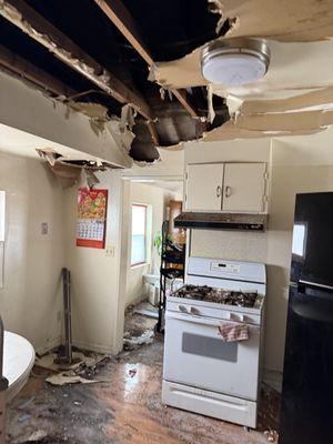 Helping fire victim remove salvage items