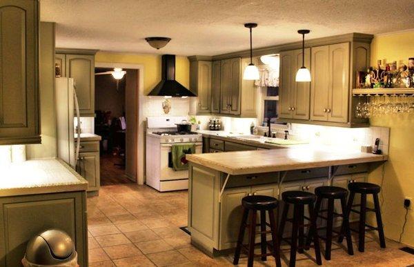 New floor, new counters, new backsplash. Happy client!