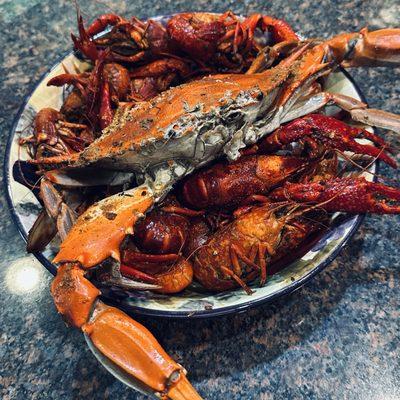 Fresh Maryland blue crab and crayfish steamed and wonderfully seasoned.