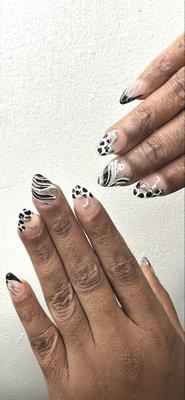Short almond shaped acrylic fullset with abstract art. Cow prints, chrome lines, silver glitter