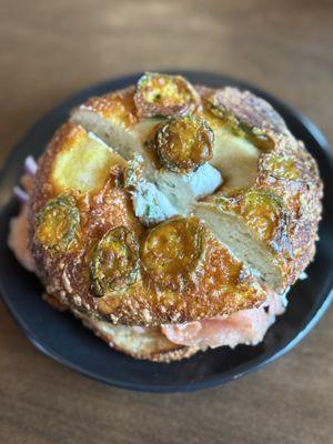 Smoked salmon on cheddar jalapeño bagel