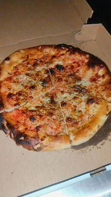 My first 12 " cheese pizza Out new Ooni oven.