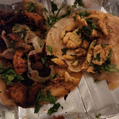 Al Pastor and pollo tacos with grilled onions Taco